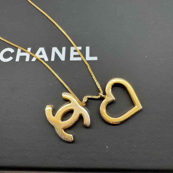 CHANEL Jewelry - Authentic CHANEL Gold Logo and Heart